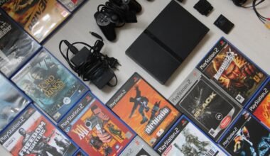 Colección de juegos físicos de PlayStation en una estantería